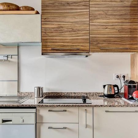 Appartement Des Toits - Welkeys Paris Exterior foto